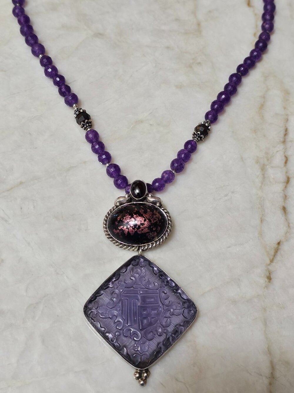 Amy Kahn Russel Handcrafted Amethyst Carved Pendant in Sterling Silver Necklace